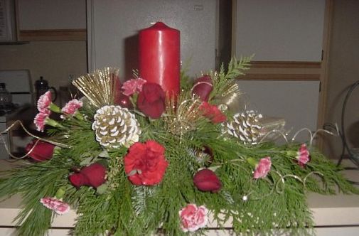 Flower for christmas with red candle.JPG
