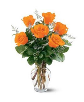 Bright orange valentine arrangement with roses.PNG