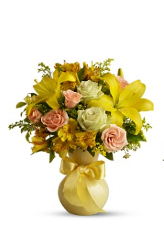 Bright yellow valentine flowers with light yellow vase photo.PNG