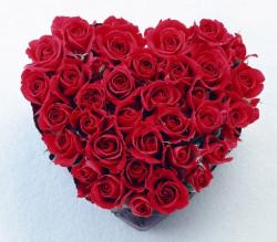 Romantic looking bouquet in heart shape with bright red roses - great Valentines Day gift ideas.JPG