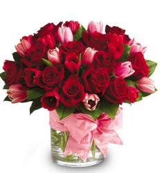 Valentines Day center piece with pink tulips and red roses.JPG