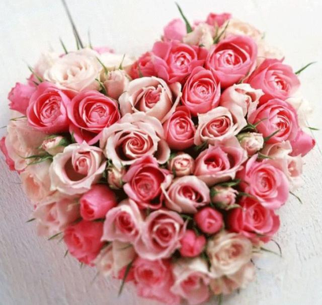 Cute heart shaped bouquet with pink roses perfect for valentines day.JPG