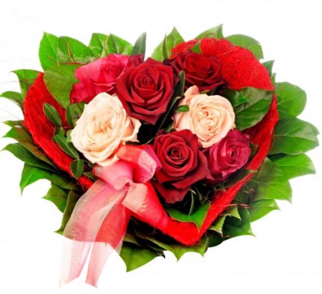 Heart shaped roses in peach and red roses with green leaves.JPG