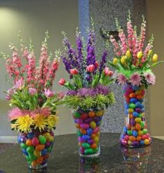 Beautiful Easter flower arrangements with colorful plastic eggs.JPG