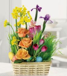 Colorful Easter flowers basket arrangement with Easter eggs.JPG