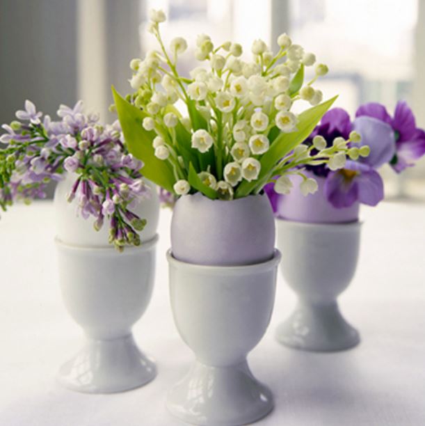 Egg Easter arrangements with white and purple flowers.JPG
