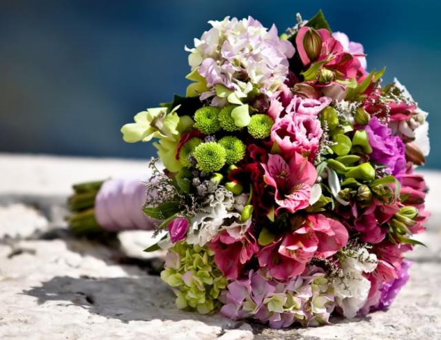 Unique bridal bouquet with many different of beautiful flowers.JPG