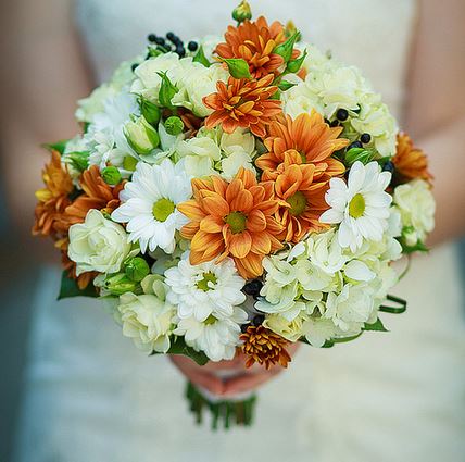 White and orange flowers bride bouquet pictures.JPG