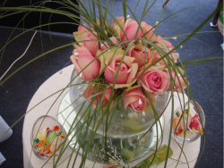 Goldfish bowl wedding arrangement with pink roses.PNG