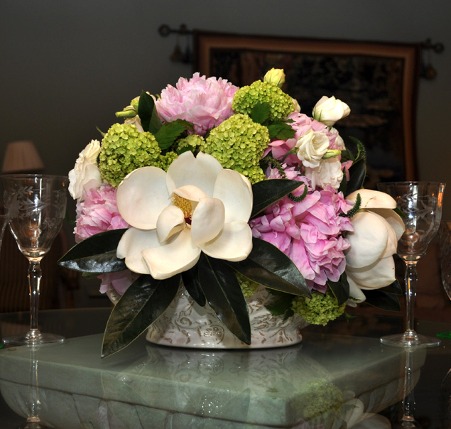 Short centerpiece with beautiful flowers.PNG