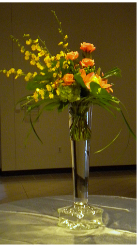 Tall glass wedding centerpiece photo.PNG