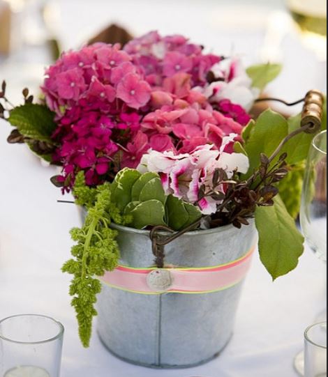 Modern wedding centerpiece with pink flowers.JPG