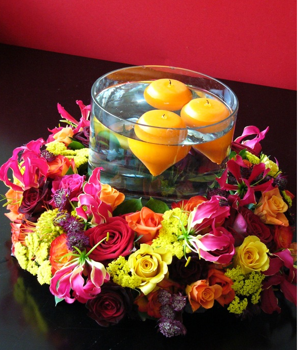 wedding arangement with floating candlelights.PNG