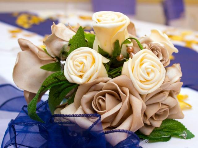 Unique bridal bouquet with cream roses and light brown roses.JPG