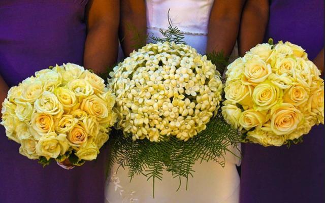Bridal bouquets pictures with brides bouquets with white small flowers and pearls.JPG