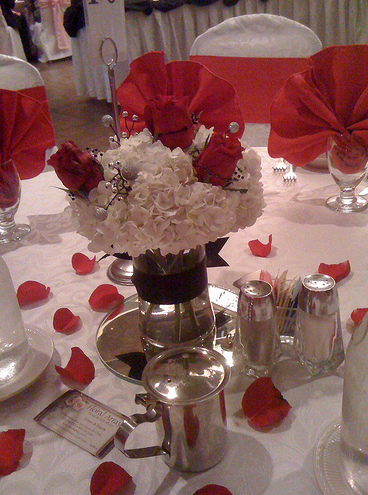 Wedding Flower Arrangement with red roses and white flowers.PNG
