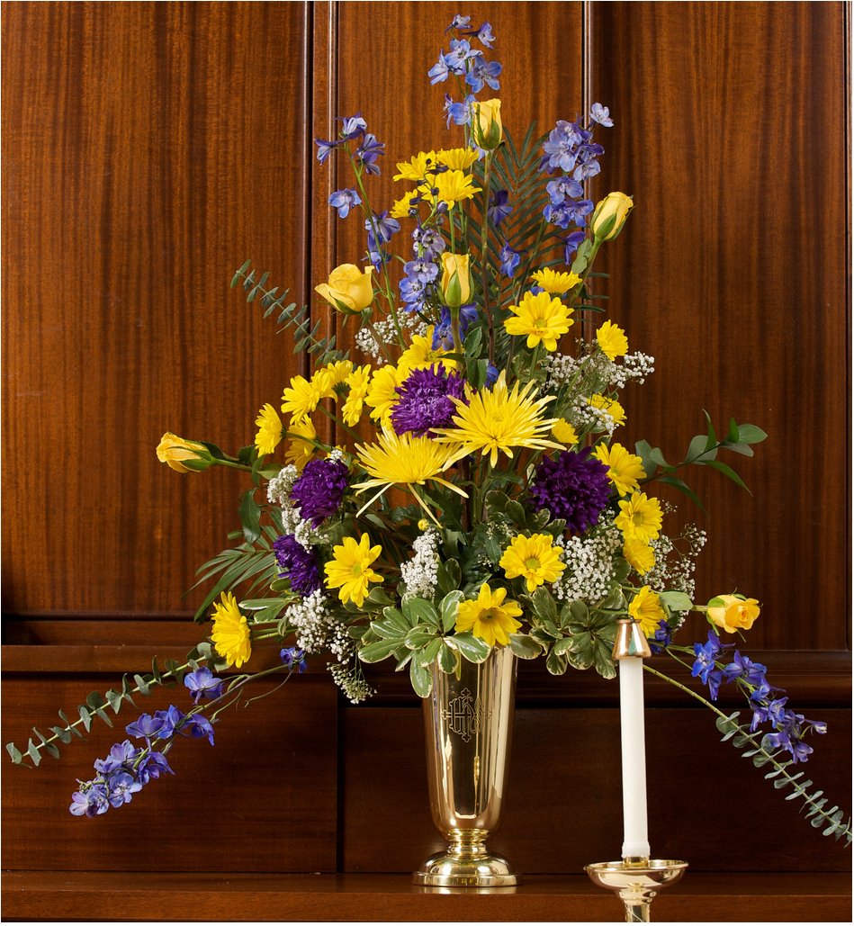 Wedding Flower Arrangement with white, yellow and purple flowers.PNG