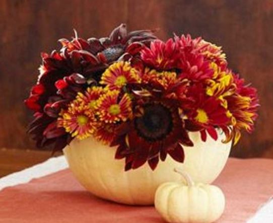 White pumpkin centerpiece with fresh red flowers photo.JPG