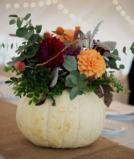 Halloween centerpiece with fresh flowers and fresh white pumpkin.JPG