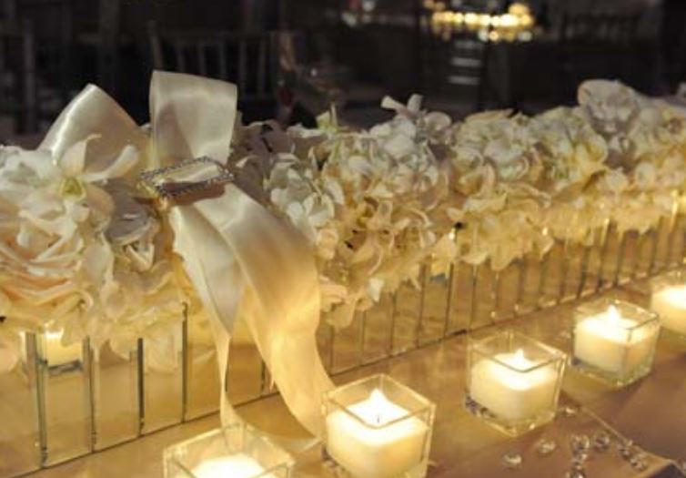 White flowers and white candles for wedding.JPG