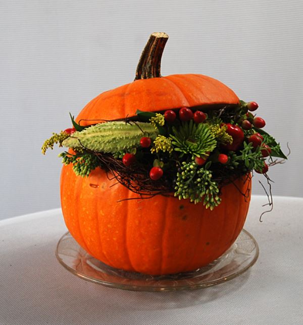 Halloween flower arrangements with fresh pumpkin and fresh flowers.JPG