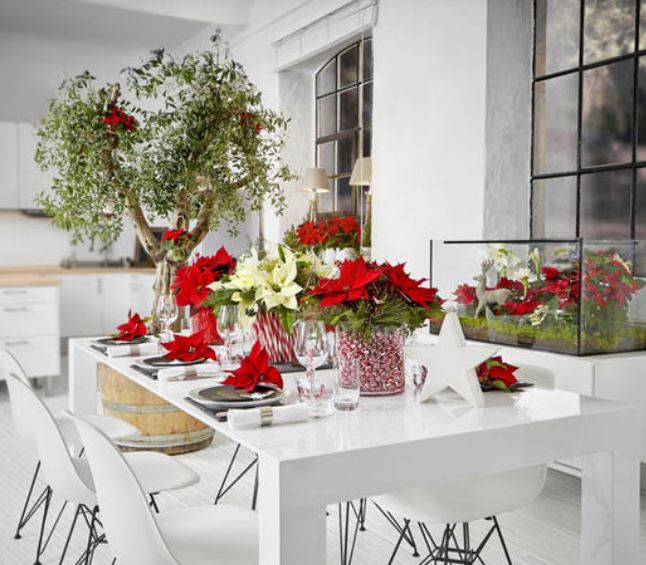 Christmas table setting with white and red poinsettias.JPG
