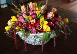 Beautiful Easter flowers arrangement with fresh spring flowers