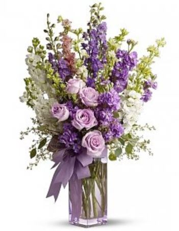 Purple flowers centerpiece perfect for mother's day