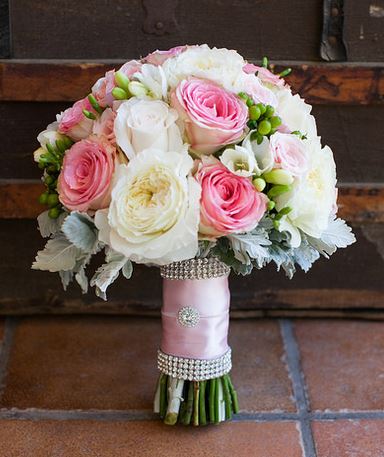 Jeweled bridal bouquet with pink flowers and white flowers