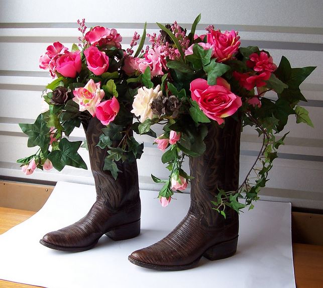 Cowboy theme wedding centerpieces in cowboy boots