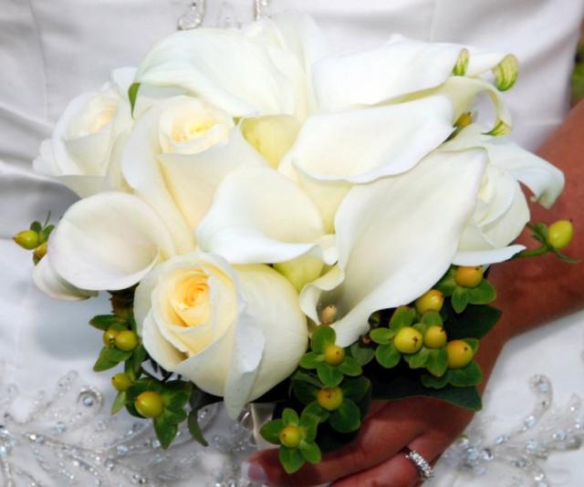 Classy wedding bouquet with white roses and lilies
