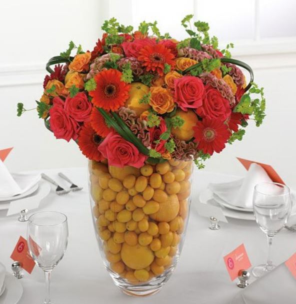 equnie wedding centerpiece with orage flowers