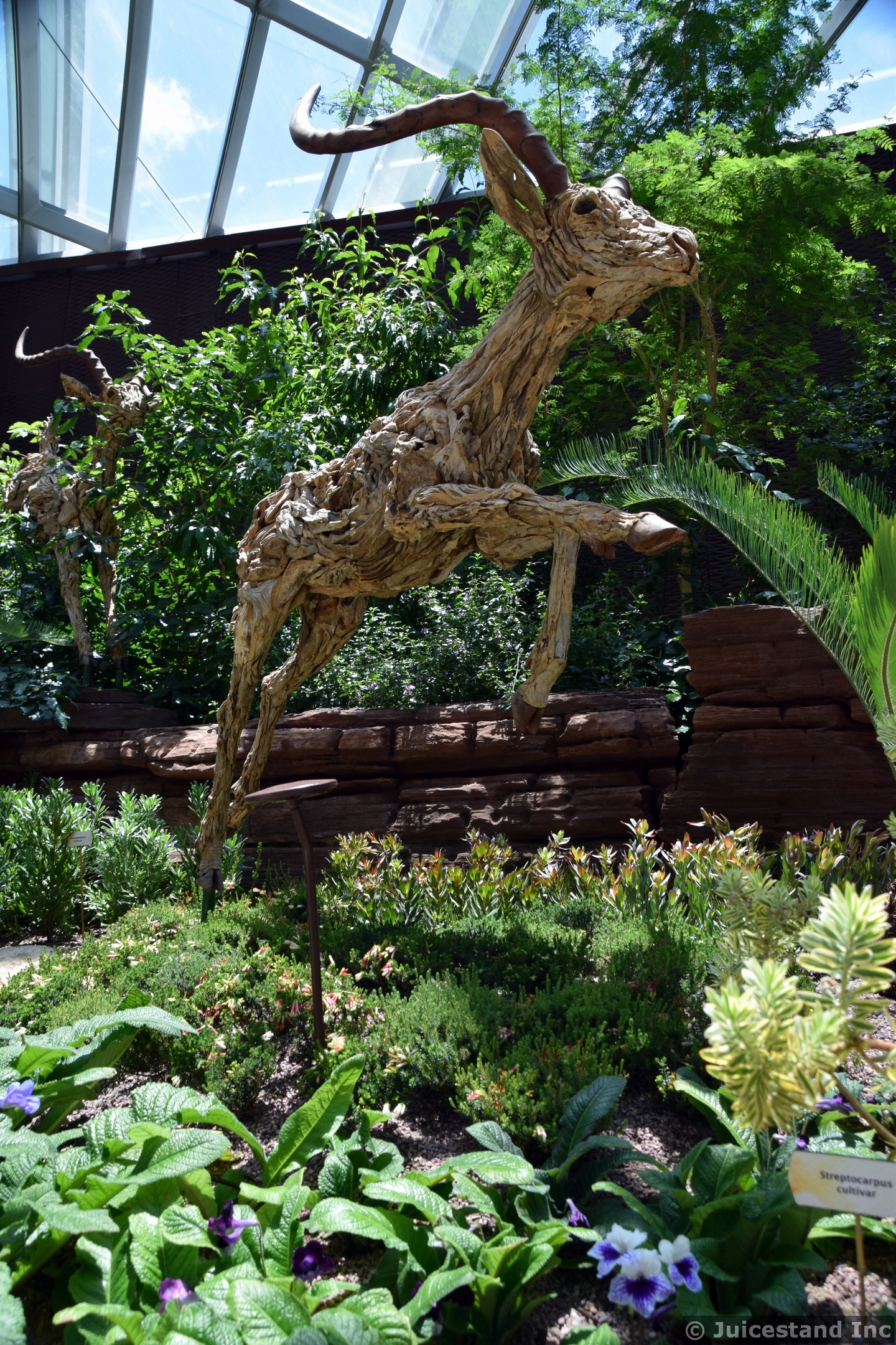 Deer Sculpture Carved Out of Wood at Flower Dome