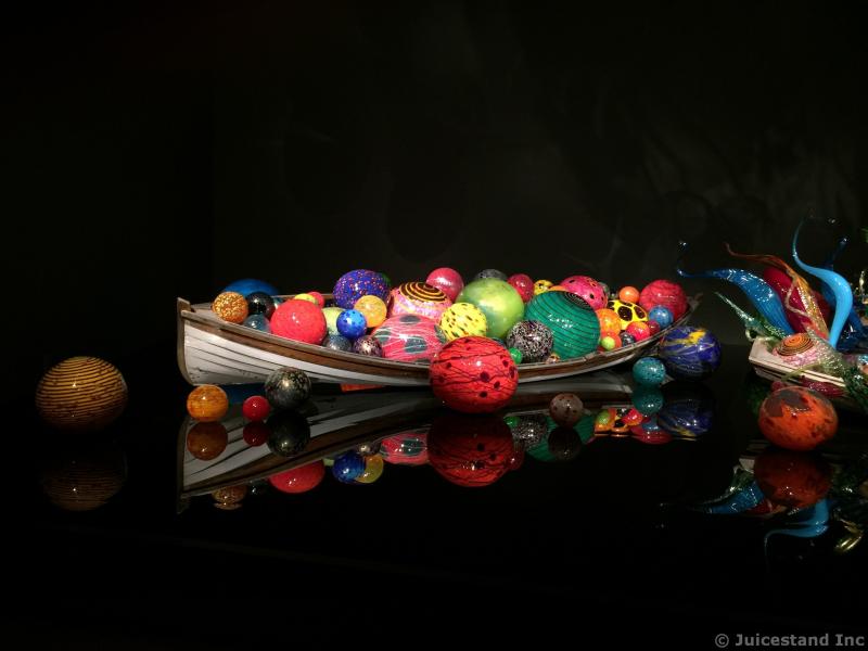 Boat of Colorful Glass Ball Sculptures