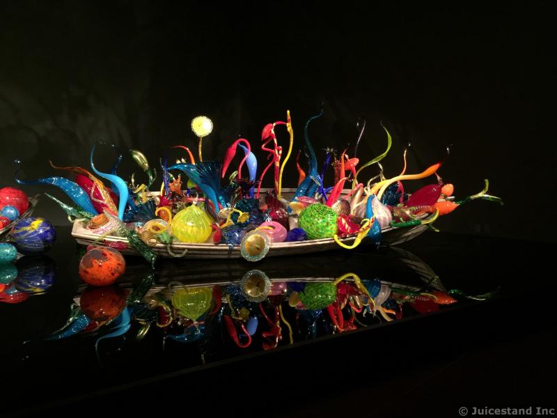 Boat of Colorful Glass Flower Sculptures