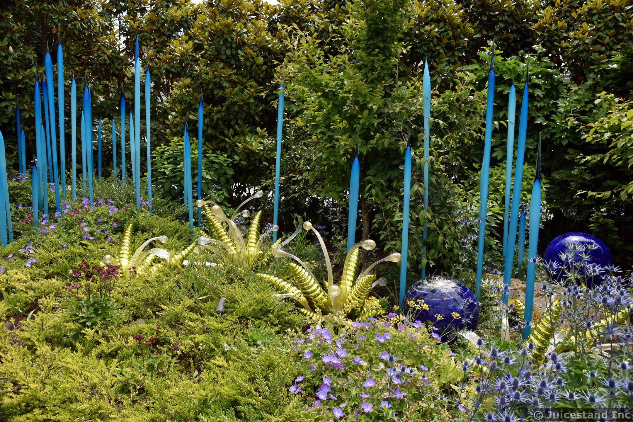 Glass Sculpture Garden Intermixed with Flowers