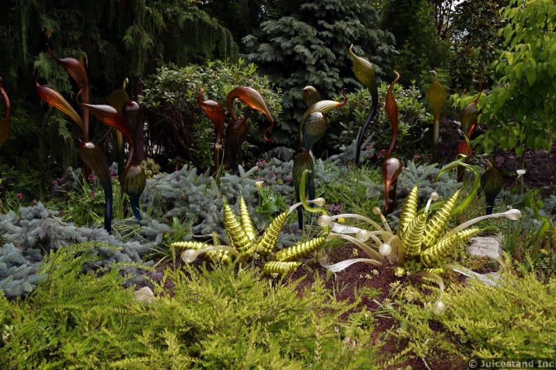 Maroon Flamingo-Esque Sculptures and Golden Horned Ones