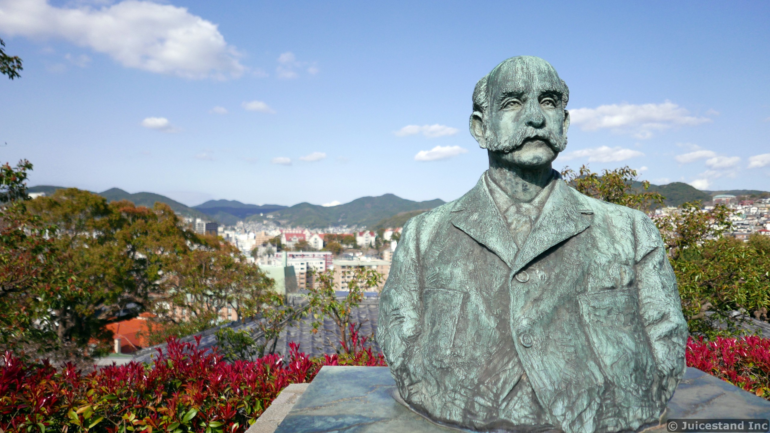 Thomas Blake Glover Statue with Nagasaki in the Background