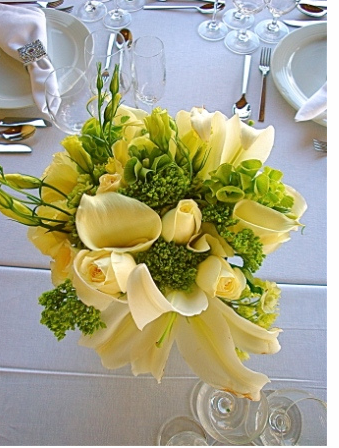 Wedding Centerpieces with yellow flowers.PNG
