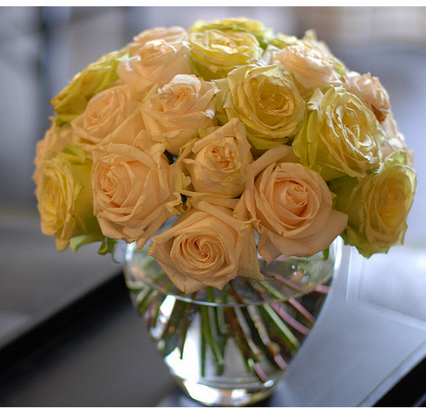 Round rose arrangement with a chic look.PNG