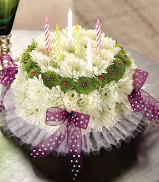 Fresh flower cake shaped flower arrangement.PNG