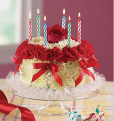 LIght yellow, white and red flowers with birthday cake shape with candles.PNG