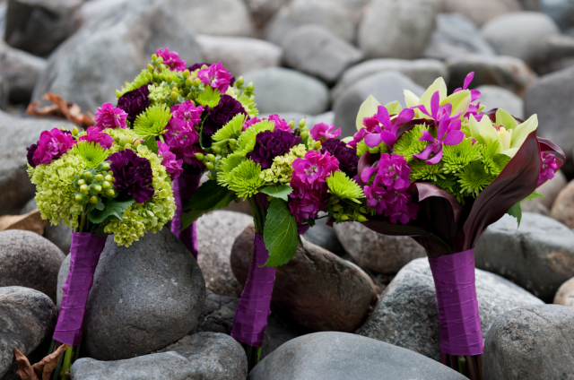 Vibrant bridal bouquet with purple and green flowers.PNG