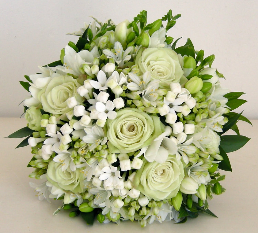 white greenish roses with small white flowers.PNG