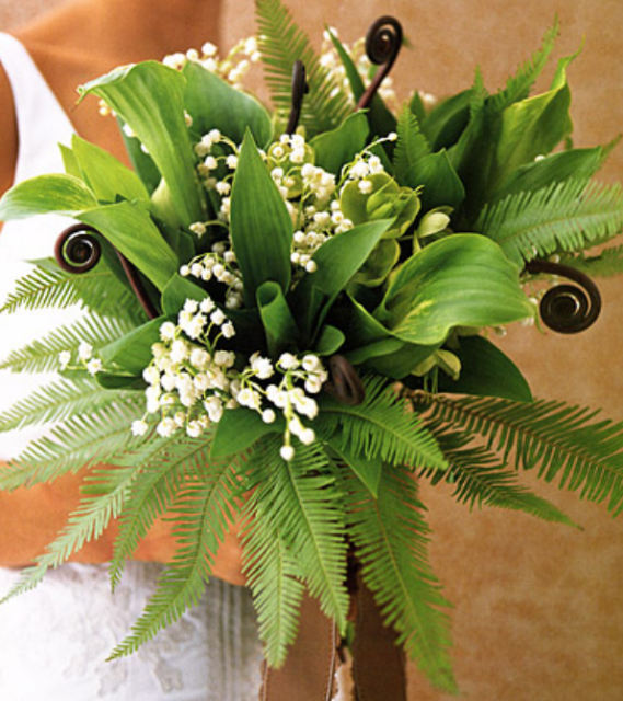 Green wedding bouquet with small white flowers.PNG