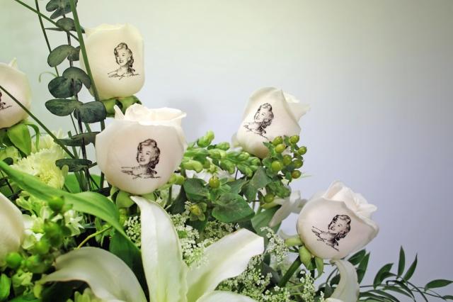 white roses with faces on flowers bridal bouquet.jpg