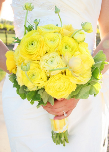 Beautiful modern wedding bouquet with big yellow flowers.PNG