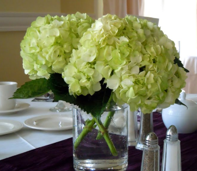 Green center pieces with big flowers.PNG