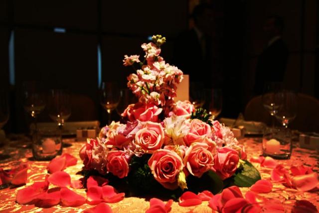 wedding center pieces with full of roses.jpg