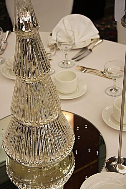 Winter wedding center piece picture of silver Christmas tree.jpg